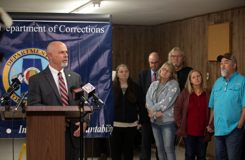  Alabama's Commissioner of the Department of Corrections John Hamm speaks to reporters next to members of victim Elizabeth Sennet's family, following the execution of Kenneth Smith by asphyxiation using pure nitrogen at Holman Correctional Facility, in Atmore, Alabama, US January 25, 2024. (credit: REUTERS/MICAH GREEN)