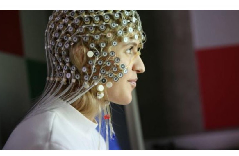 An EEG Geodesic Sensor Net with 256 evenly distributed sensors that was used to record EEG activity from the participant's scalp during the research. (credit: NTNU/Microsoft)