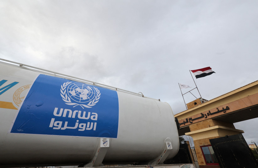  UNRWA truck crosses into Egypt from Gaza at Rafah border crossing, November 27, 2023 (credit: REUTERS/AMR ABDALLAH DALSH)