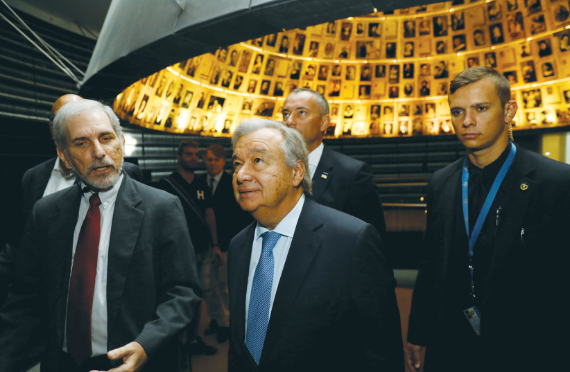  UN SECRETARY-GENERAL Antonio Guterres is guided through the Hall of Names at Yad Vashem, during a visit to Israel in 2017. (credit: RONEN ZVULUN/REUTERS)