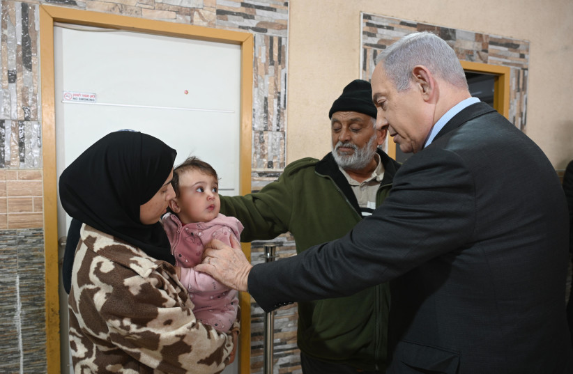 Prime Minister Binyamin Netanyahu expresses his condolences to the family of fallen Bedouin IDF soldier Ahmad Abu Latif. January 29, 2024. (credit: CHAIM TZACH/GPO)