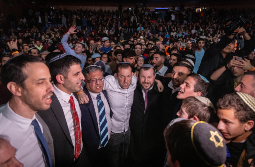  Ministers and MK's dance during the 'Resettle Gaza Conference' at the International Convention Center in Jerusalem on January 28, 2024 (credit: FLASH90/CHAIM GOLDBERG)