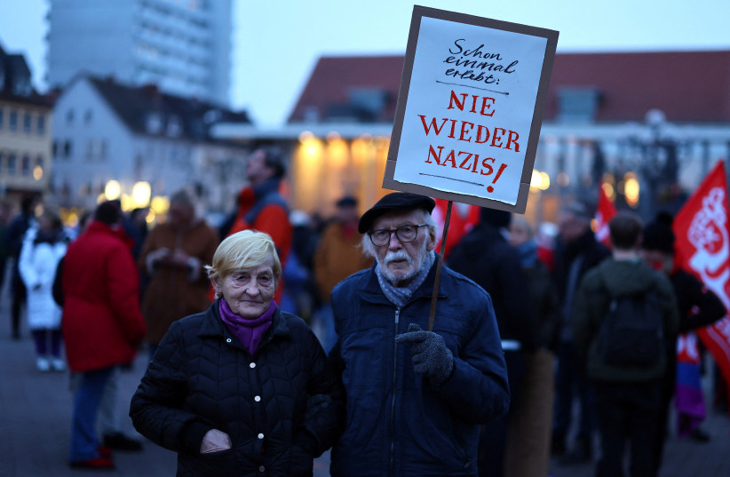  People attend a protest against the Alternative for Germany party (AfD) in Hanau, Germany, January 30, 2024. (credit: REUTERS/KAI PFAFFENBACH)