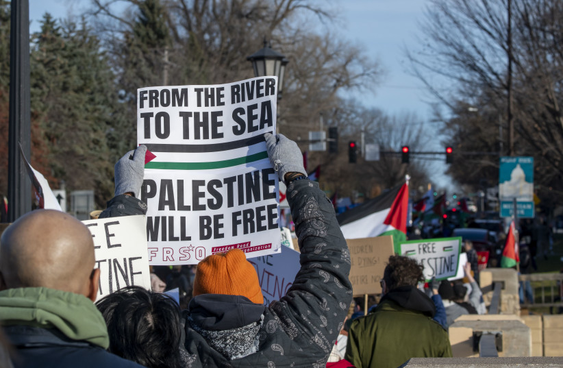  Protesters at a pro-Palestinian rally in St. Paul, Minnesota, push the state to divest from Israel in the wake of the war in Gaza, Nov. 19, 2023. (credit: Michael Siluk/UCG/Universal Images Group via Getty Images)
