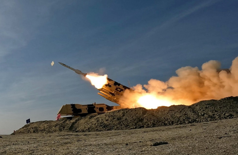  A missile is launched during a military exercise in an undisclosed location in the south of Iran, in this handout image obtained on January 19, 2024 (credit: IRANIAN ARMY/WANA/REUTERS)
