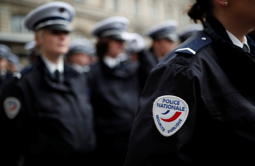  French Police officers stand at attention during a ceremony at the Police Prefecture in Paris, France, December 20, 2018.  (credit: REUTERS/BENOIT TESSIER)