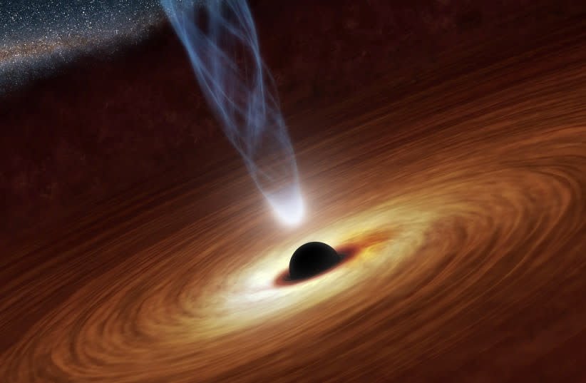  Un agujero negro supermasivo con millones o miles de millones de veces la masa de nuestro sol en una ilustración sin fecha de la NASA. (credit: REUTERS/NASA/JPL-CALTECH/HANDOUT)