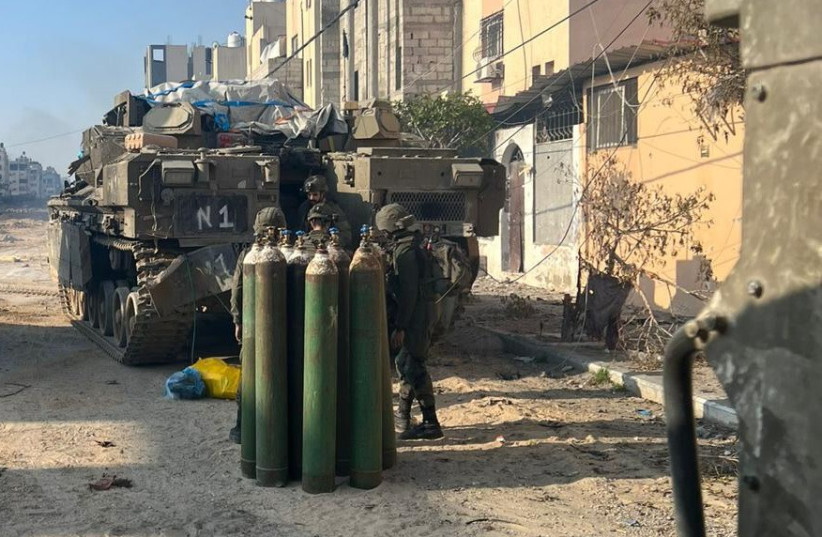  IDF soldiers delivering medical equipment to the Al Amal hospital in Khan Yunis in the Gaza Strip, February 10th, 2024 (credit: IDF SPOKESPERSON'S UNIT)