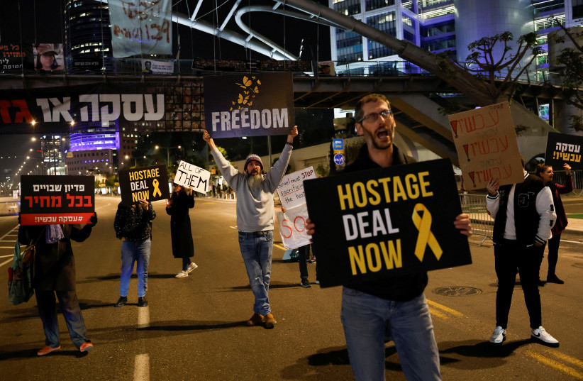  Supporters of hostages take part in a protest calling for their release, in Tel Aviv (credit: REUTERS/SUSANA VERA)