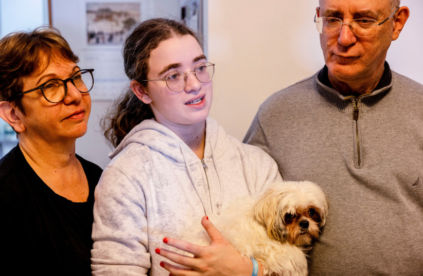  Mia Leimberg, 17, released from captivity after being taken hostage by Hamas in the Gaza Strip with her mother Gabriela and her dog Bella, December 5, 2023 (credit: RONEN ZVULUN/REUTERS)