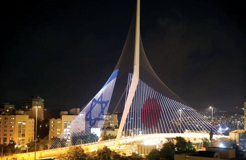  Chords Bridge is bright with flags in solidarity with Japan. (credit: ARNON BOSSANI)