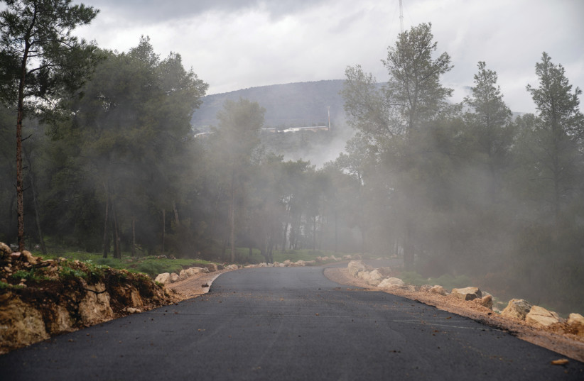   FOG IN the Upper Galilee blankets one of the new roads the IDF built to help people access communities threatened by Hezbollah. (credit: IDF SPOKESPERSON'S UNIT)