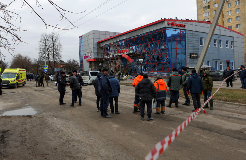  People gather near a shopping centre hit by a missile strike, what local authorities called a Ukrainian military attack, in the course of Russia-Ukraine conflict in Belgorod, Russia, February 15, 2024. (credit:  REUTERS/Stringer)