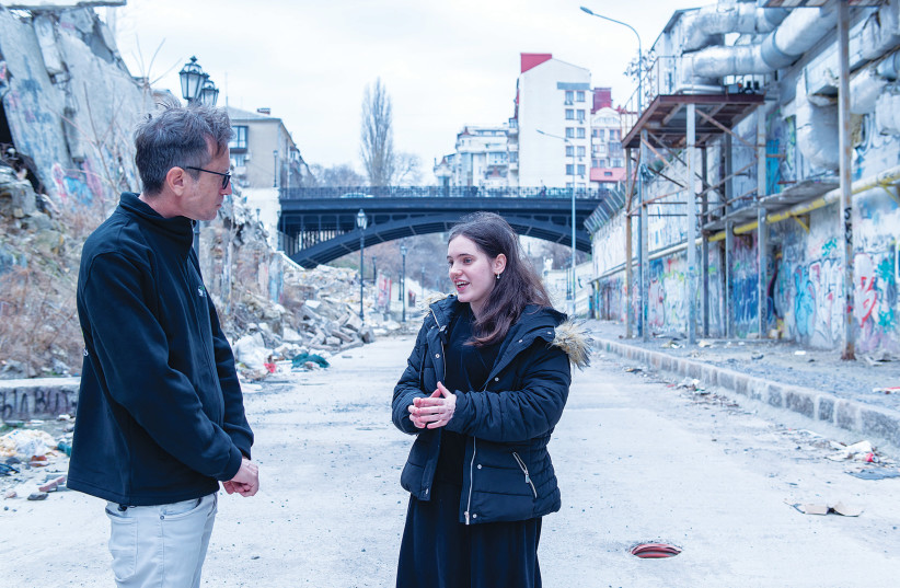  OUTSIDE HER school in Odesa, Chaya Mushka tells an IFCJ worker about her experiences.  (credit: SERGEY MAMAY)