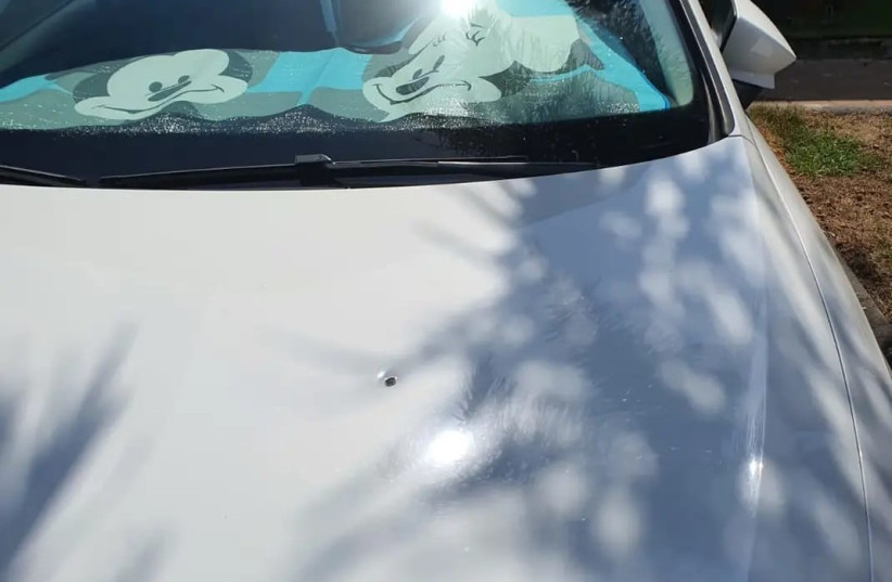  A bullet hole in the hood of a car in Bat Hefer. (credit: Courtesy Gad Ohayon)