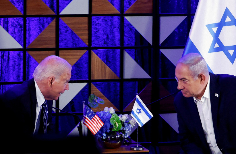  U.S. President Joe Biden attends a meeting with Israeli Prime Minister Benjamin Netanyahu, as he visits Israel amid the ongoing conflict between Israel and Hamas, in Tel Aviv, Israel, October 18, 2023 (credit: EVELYN HOCKSTEIN/REUTERS)