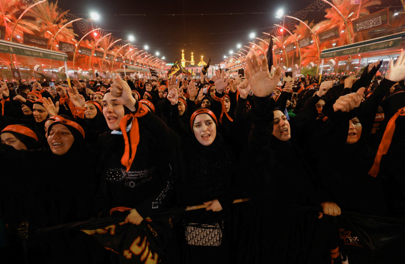  Shi'ite Muslim pilgrims take part in a mourning ceremony, during the holy Shi'ite ritual of Arbaeen, in the holy city of Karbala, Iraq September 5, 2023. (credit: ALAA AL-MARJANI/REUTERS)