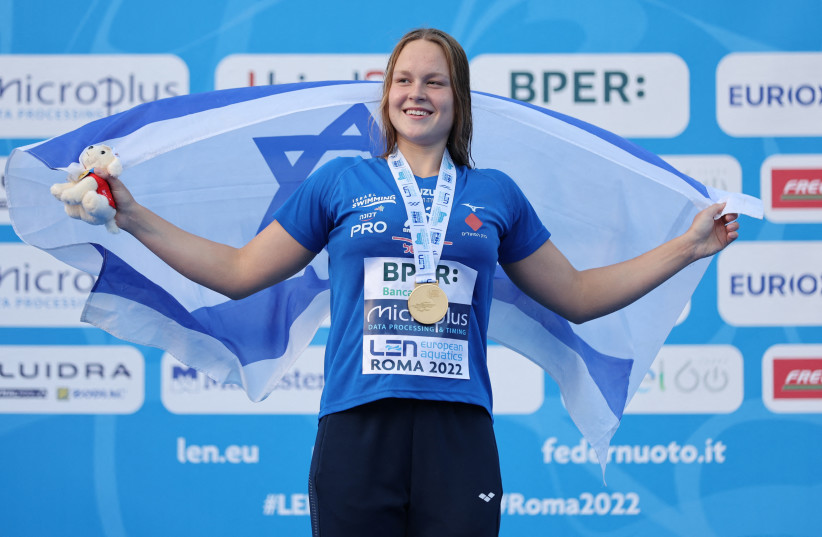  Israel's Anastasia Gorbenko celebrates on the podium after winning gold at the European Aquatics Championships (credit: REUTERS/ANTONIO BRONIC)