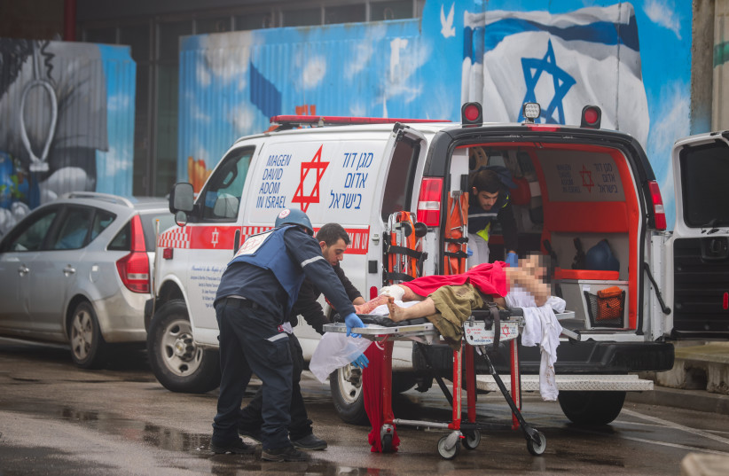  Injured People arrive to the Ziv Medical center in Tzfat,  after being injured from a missile fired by the terrorist organization Hezbollah earlier today in the northern Israeli city of Tzfat, February 14, 2024.  (credit: DAVID COHEN/FLASH 90)