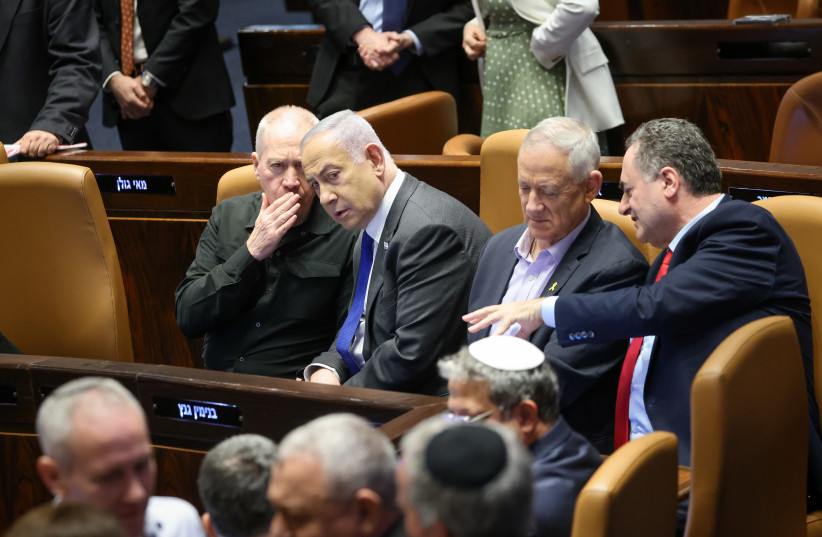 Yoav Gallant, Benjamin Netanyahu, Benny Gantz and Israel Katz in the Knesset plenum on February 21, 2024 (credit: NOAM MOSKOVICH/KNESSET)