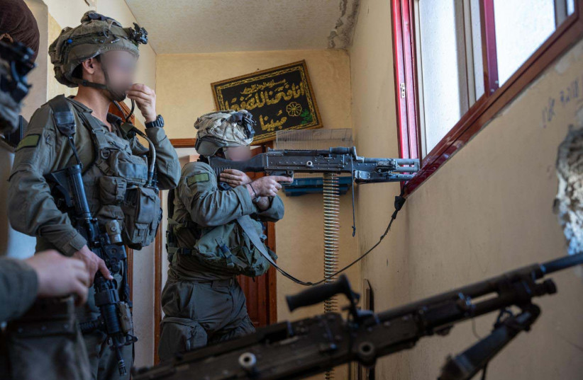 Israeli soldiers operate in the Gaza Strip, February 21, 2024 (credit: IDF SPOKESPERSON'S UNIT)