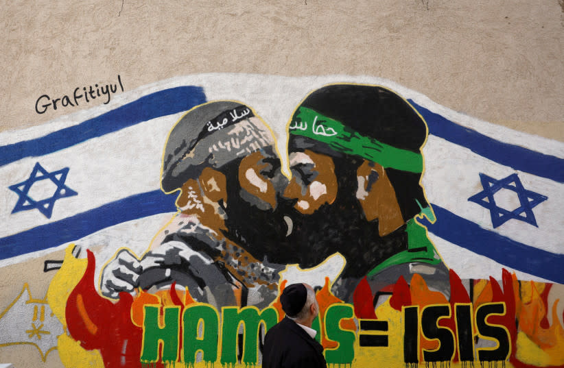  Un hombre observa una pintada, en medio del actual conflicto entre Israel y el grupo islamista palestino Hamás, en Tel Aviv, Israel, 8 de febrero de 2024. (credit: REUTERS/SUSANA VERA)