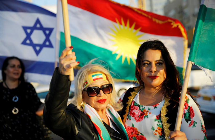  Israelis mainly of Kurdish origin take part in a gathering outside the American embassy in Tel Aviv, Israel October 26, 2017 (credit: REUTERS/AMIR COHEN)