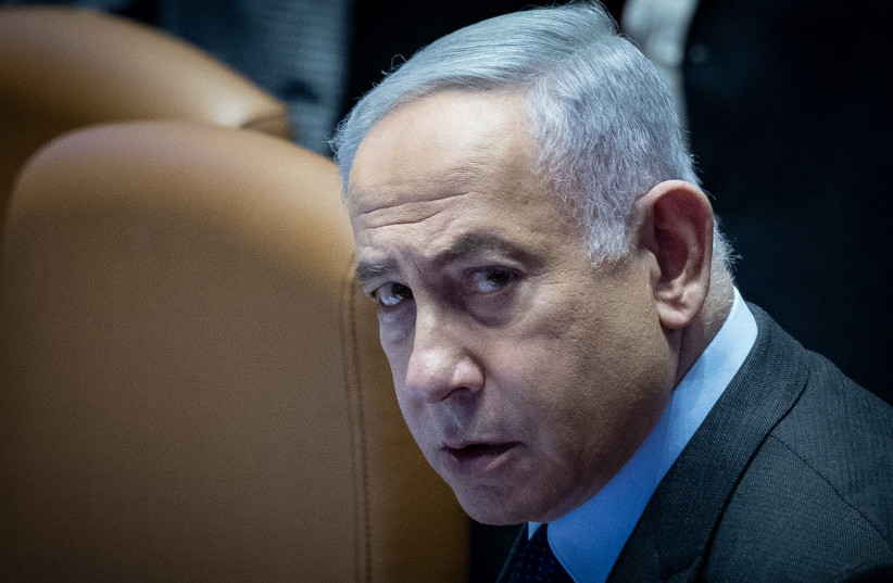  Israeli prime minister Benjamin Netanyahu arrives to a discussion and a vote on the expulsion of MK Ofer Cassif at the assembly hall of the Knesset, the Israeli parliament in Jerusalem, February 19, 2024. (credit: YONATAN SINDEL/FLASH90)