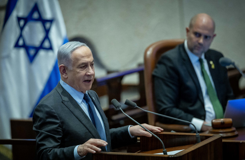  Israeli prime minister Benjamin Netanyahu speaks during a plenum session at the assembly hall of the Knesset, the Israeli parliament in Jerusalem, on February 19, 2024. (credit: YONATAN SINDEL/FLASH90)