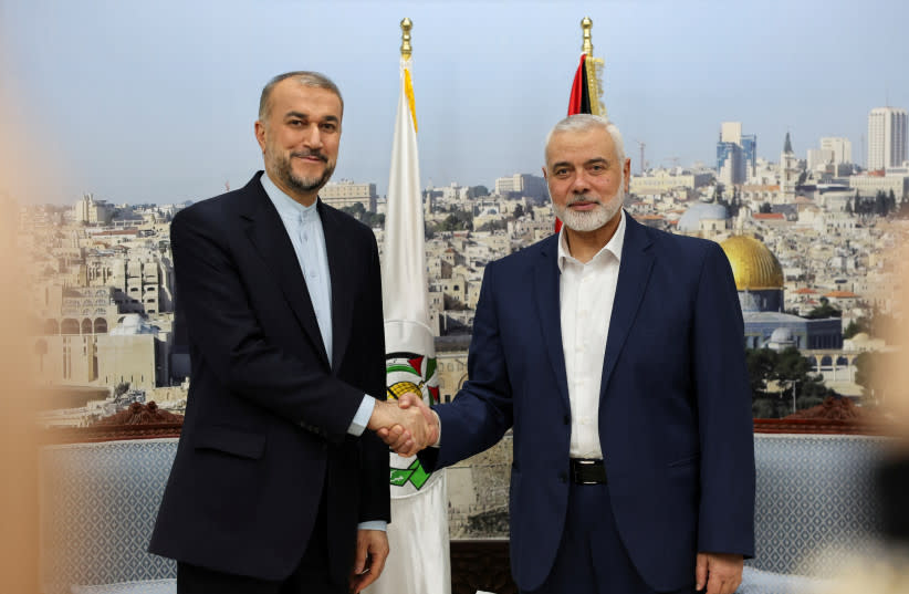  El ministro de Asuntos Exteriores de Irán, Hossein Amir Abdollahian, se reúne con el máximo dirigente de Hamás, Ismail Haniyeh, en Doha, Qatar, el 20 de diciembre de 2023. (credit: IRAN'S FOREIGN MINISTRY/WANA (WEST ASIA NEWS AGENCY)/HANDOUT VIA REUTERS)