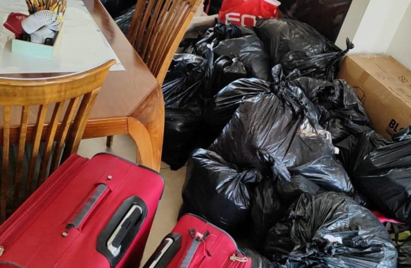  The belongings of Yaheli and Tsud Badichi, residents of Kiryat Shmona who were hurriedly evacuated from their homes. (credit: sivanrahavmeir.com)
