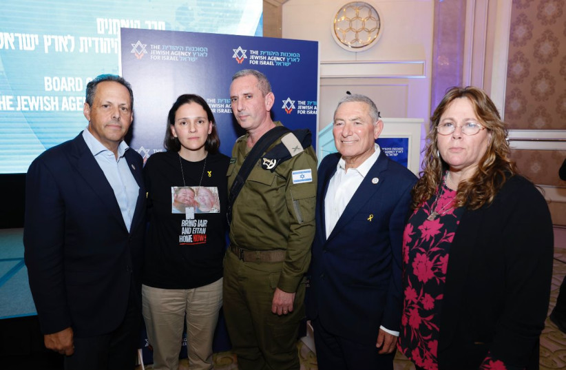  IDF Spokesperson R.-Adm. Daniel Hagari. To his right: Amira Ahronovitz, the CEO of the Jewish Agency, and Doron Almog, Chairman of the Jewish Agency's Executive. To his left: Dalia Kushnir, Director of Experiences in the Jewish Agency's Connectivity Unit, whose two Brothers in law, Yair and Eitan Horn (credit: Guy Yechiely for the Jewish Agency)