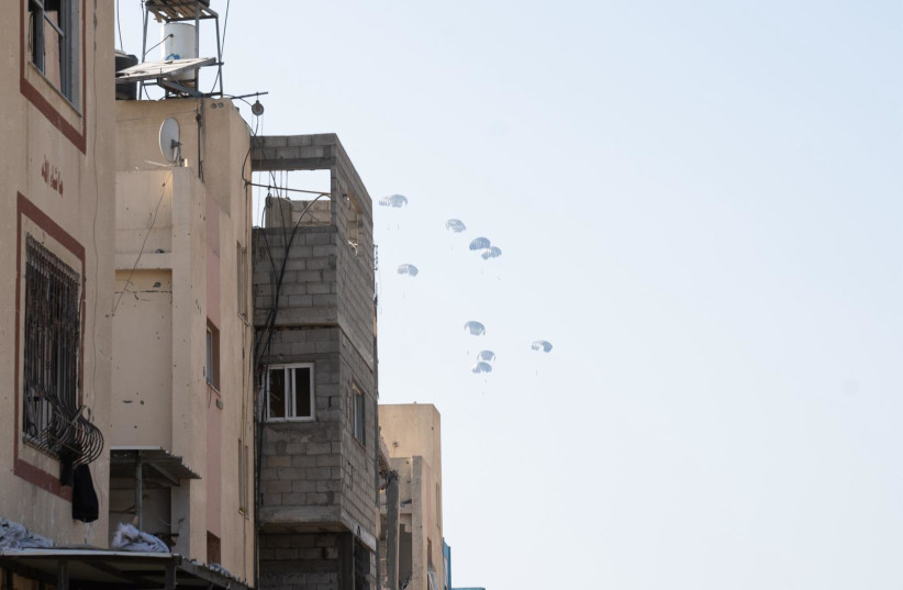  Humanitarian aid is seen airdropped to residents of southern Gaza by a joint-coordinated effort, February 28, 2024. (credit: IDF SPOKESPERSON UNIT)