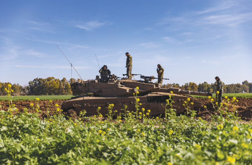  An IDF tank is seen near the Gaza border. (credit: FLASH90)
