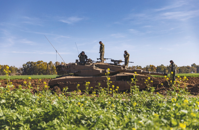 An IDF tank is seen near the Gaza border.