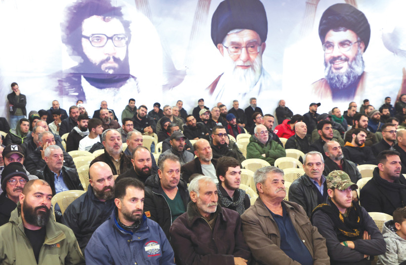  LEBANON’S HEZBOLLAH supporters listen to leader Hassan Nasrallah’s televised address at a memorial ceremony to mark one week since the passing of former Hezbollah deputy Muhammad Yaghi, in Baalbek, earlier this year.  (credit: MOHAMED AZAKIR/REUTERS)