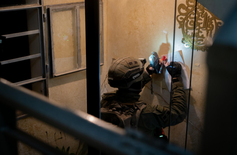  IDF troops map the house of the terrorist who carried out the deadly Eli gas station shooting, February 29, 2024 (credit: IDF SPOKESPERSON'S UNIT)