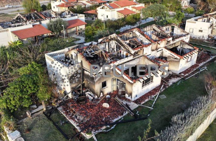  Damaged houses are seen, following the deadly October 7 attack by gunmen from Palestinian militant group Hamas from the Gaza Strip, in Kibbutz Beeri in southern Israel, November 28, 2023.  (credit: ILAN ROSENBERG/REUTERS)