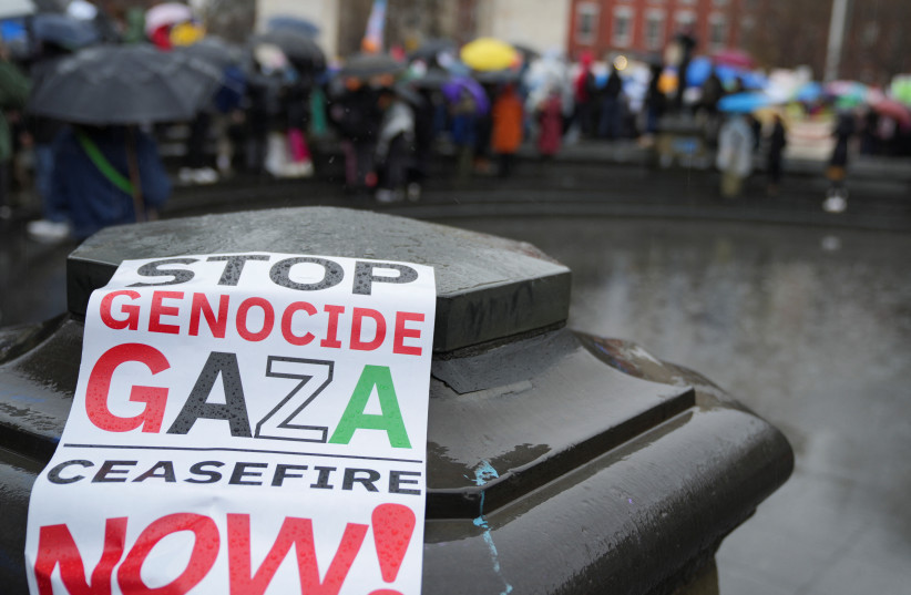  A sign is seen as people take part in a protest that organizers billed as ''Millions March for Gaza'', a global day of action opposing the impending Israeli operation into Rafah, amid the ongoing conflict between Israel and the Palestinian Islamist group Hamas, in New York City, U.S., March 2, 2024. (credit: David Dee Delgado/Reuters)