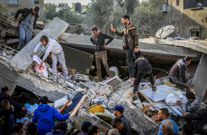  Palestinians search for missing people under the rubble after an Israeli air strike on a house belonging to the Abu Anza family, in the city of Rafah, southern Gaza Strip, on March 3, 2024 (credit: ABED RAHIM KHATIB/FLASH90)