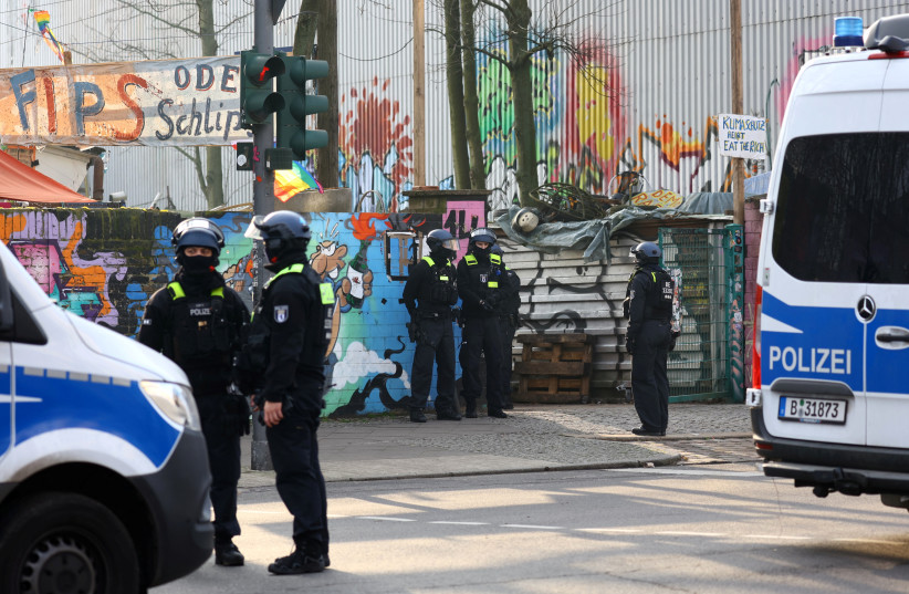 German special police secures the area as they search for long-sought members Ernst Volker S. and Burkhard G. of Germany's notorious Red Army Faction (RAF) militant group, after decades on the run from armed robbery and attempted murder charges, in Berlin, Germany, March 3, 2024 (credit: Christian Mang/Reuters)