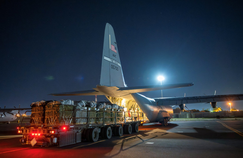  Over 38,000 Meals Ready to Eat and water destined for an airdrop over Gaza are loaded aboard a U.S. Air Force C-130J Super Hercules at an undisclosed location in Southwest Asia, March 1, 2024. U.S. Air Force (credit: REUTERS)