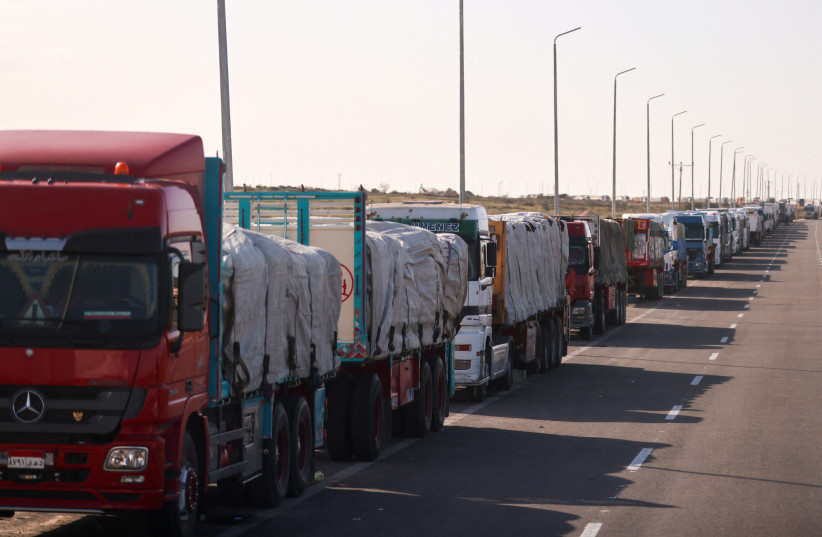  Trucks carrying aid line up near the Rafah border crossing between Egypt and the Gaza Strip, amid the ongoing conflict between Israel and Palestinian Islamist group Hamas, in Rafah, Egypt, February 1, 2024. (credit: MOHAMED ABD EL GHANY/REUTERS)
