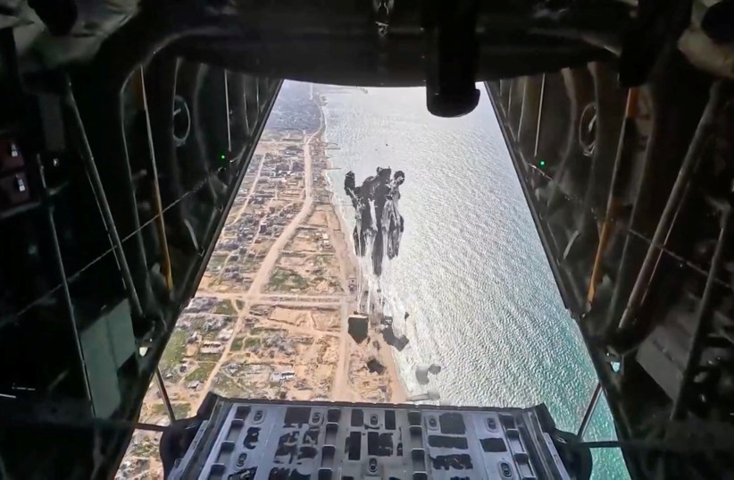  U.S. Air Force drops humanitarian aid for Gaza residents, in this screengrab from a video released on March 5, 2024.  (credit:  US Central Command via X/Handout via REUTERS )