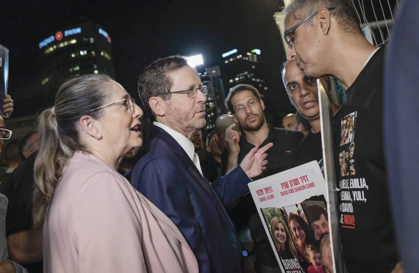  VISITING CAPTIVES’ families in Tel Aviv’s Hostages Square with her husband, President Isaac Herzog, Nov. 9. (credit: FLASH90)