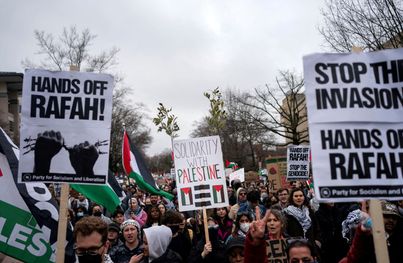  Pro-Palestinian demonstrators march outside the Israeli embassy to call for a ceasefire in Gaza, amid the ongoing conflict between Israel and the Palestinian Islamist group Hamas, during a protest in Washington, U.S., March 2, 2024. (credit: Bonnie Cash/Reuters)