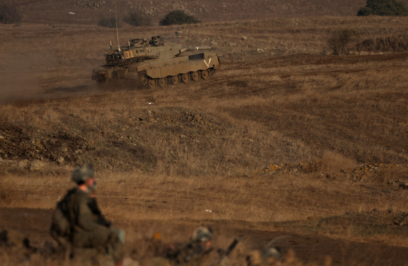  Israeli soldiers take part in a military drill near the border between Israel and Syria at the Israeli-occupied Golan Heights, November 2, 2023. (credit: Violeta Santos Moura/Reuters)