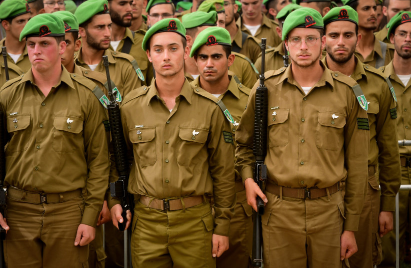 The funeral of Col. Sharon Asman, Nahal Brigade commander who died after collapsing during fitness training last week, in Kiryat Shaul Military Cemetery, July 4, 2021.  (credit: AVSHALOM SASSONI/FLASH90)