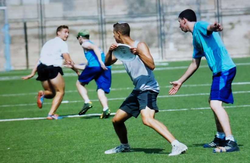 ASHER LOOKING for a pass from Yosef at a Pesach Ultimate Tournament several years ago. The brothers were a skillful, scoring duo on the field, and very close away it. (credit: Israeli Flying Disc Association (IFDA))