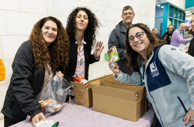  Volunteers in Netanya with IACC. (credit: Courtesy)
